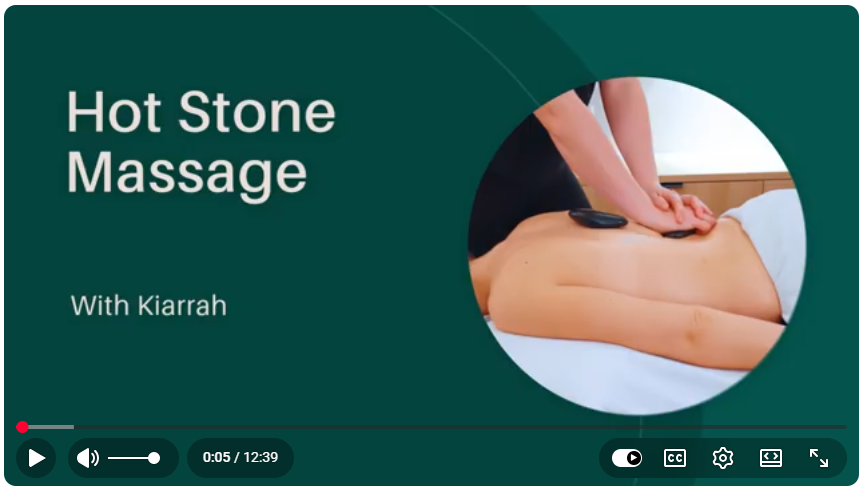 Hot Stone Massage for Back Pain Relief at Revamp Wellness.